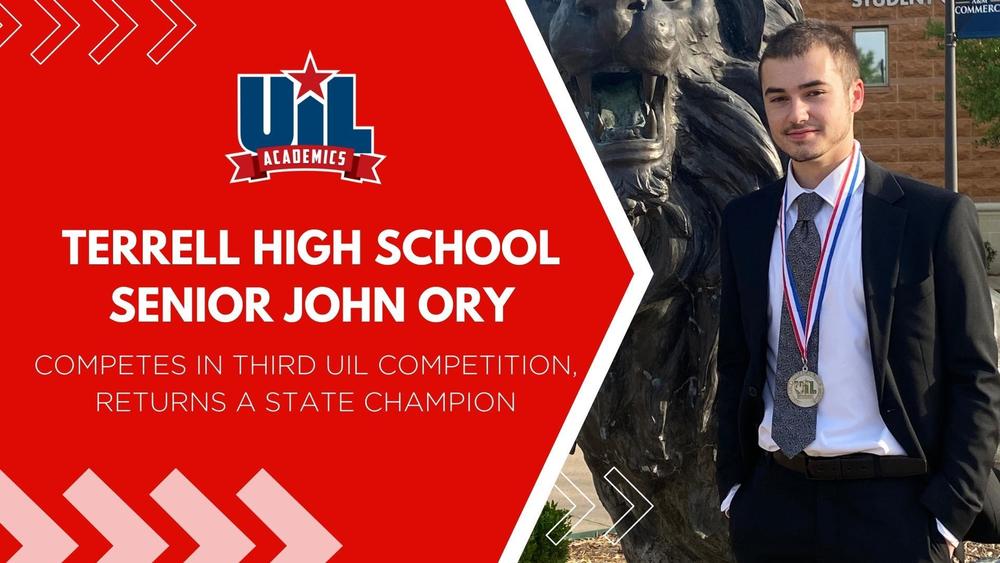 Male student in front of UIL backdrop with gold medal